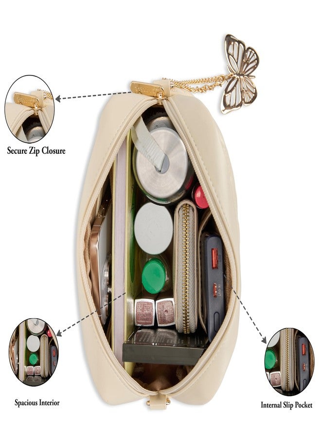 كابريس حقيبة كتف متوسطة الحجم من كابريس كلاود للنساء | حقيبة كروسبودي وكتف من الجلد الصناعي المنقوش | حزام قابل للتعديل والفصل | حقيبة متعددة الجيوب بسحاب إغلاق وزينة فراشة (لون الشوفان الألبي) - Image 4